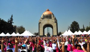 Mexico City Rising, Over ten thousand people gather in Mexico City’s Monumento Revolución (Photo Credit: Karla Danitza Alderete) >