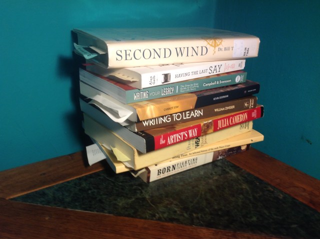 Nine books on my nightstand--and you'd see an iPad too, if I weren't using it to take the photo.