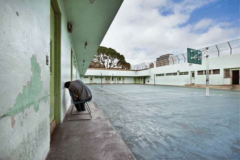 Eleventh-grade inmate on recreational compound at former Honolulu Juvenile Detention Center. Photo courtesy of Richard Ross, juvenile-in-justice.com]